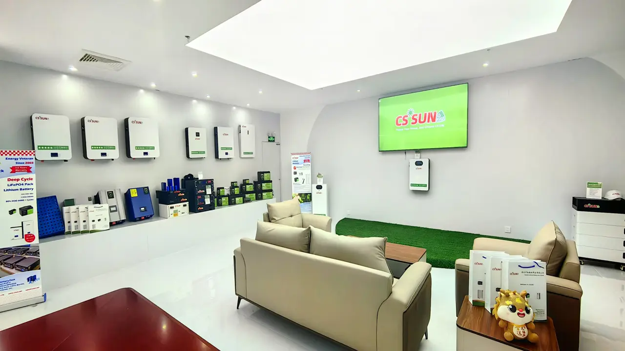 CSSUN showroom with battery displays and a visitor seating area